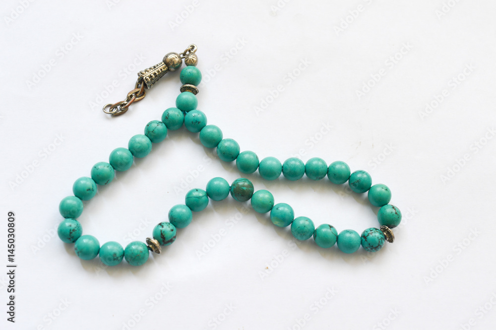 blue beads isolated on white blue beads isolated on white