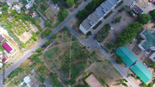 Wallpaper Mural Aerial view of the road and houses in the Berdyansk city, Ukraine. 4K, Ultra HD video.  Torontodigital.ca