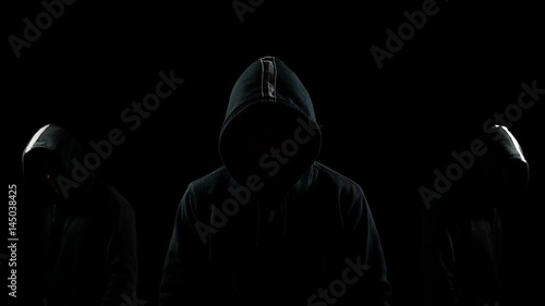 Faceless men in the dark photo