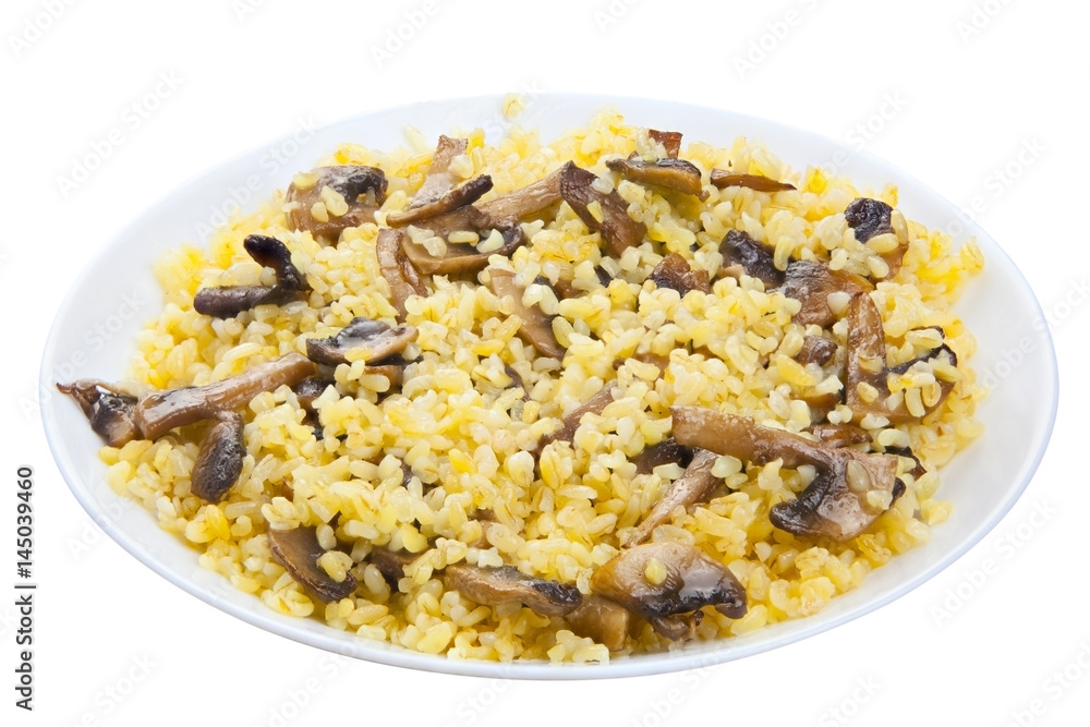 Delicious home made pilaw from wheat on plate Delicious home made pilaw from wheat on plate