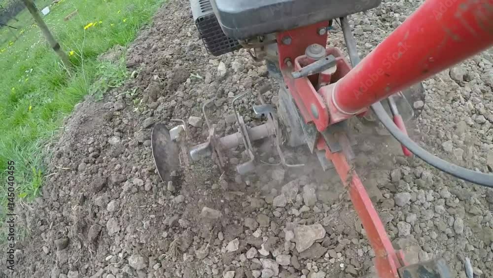 Closeup of hand motor plow blade throwing clay.
Focus on the preparation of agricultural land. Slowmotion.
Closeup of hand motor plow blade throwing clay.
Focus on the preparation of agricultural land. Slowmotion.