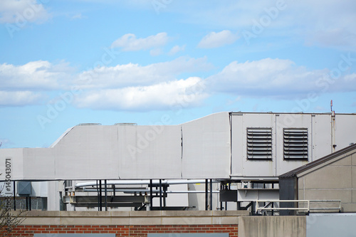 pipes of air conditioning system on top of the roof