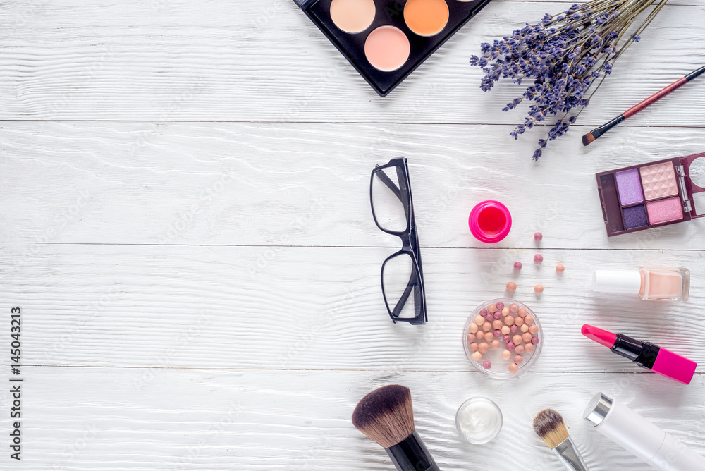 glasses and cosmetics on white woman table background top view glasses and cosmetics on white woman table background top view
