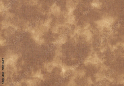 タイダイ染めの茶色の布背景