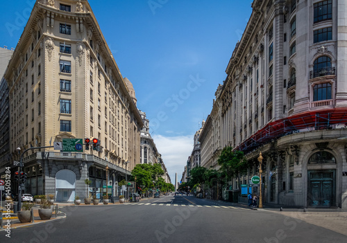 Downtown Buenos Aires Diagonal Norte Street with the Obelisk as background - Buenos Aires, Argentina © diegograndi