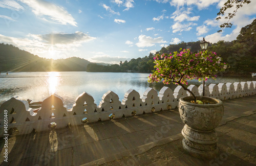 Dramatic sunrise at Kandy Lake and the Clouds Wall (Walakulu Wall), Kandy, Central Province, Sri Lanka, Asia photo