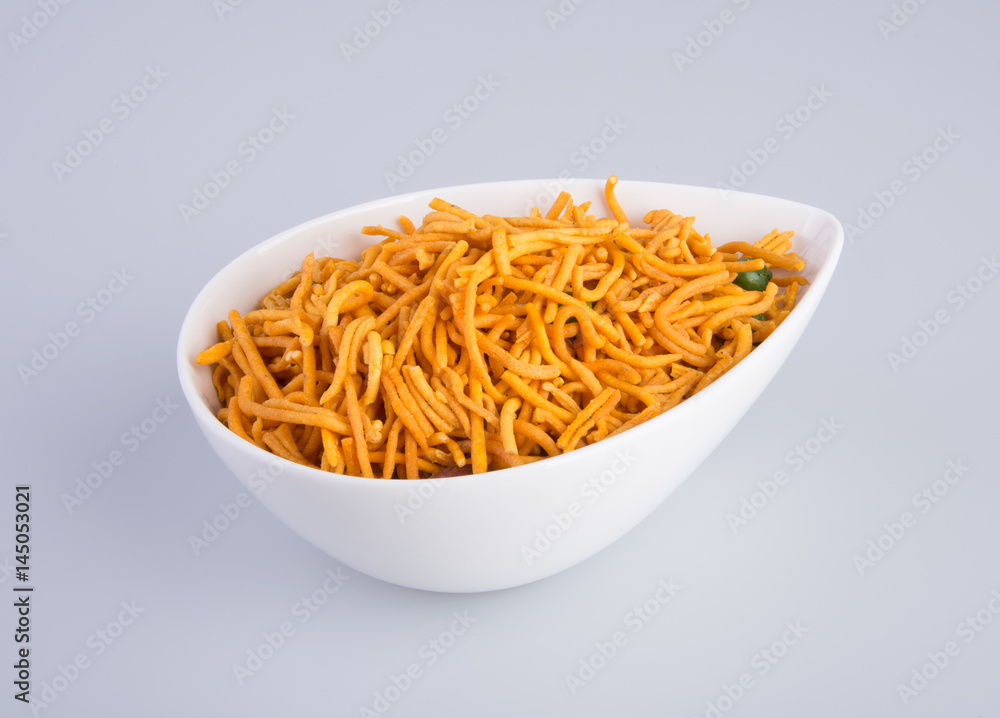 murukku or traditional indian snack chakli and chakali on background. murukku or traditional indian snack chakli and chakali on background.