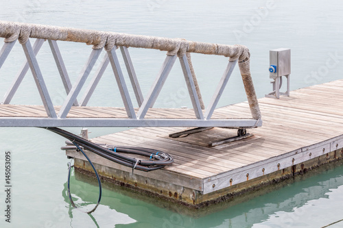 Slope walkway to the wooden dock of Fisherman village.