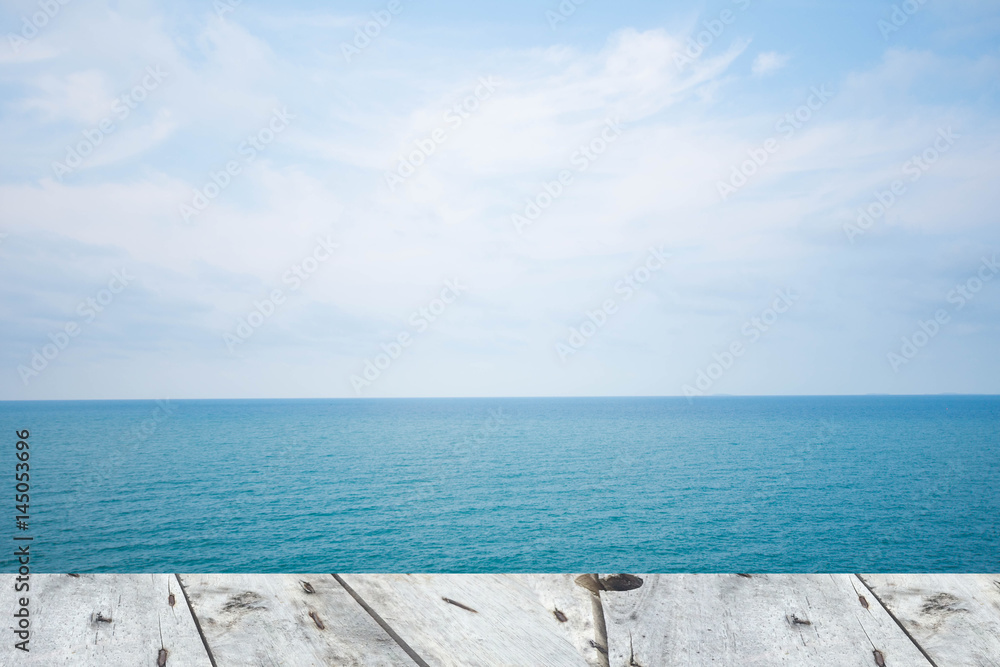 wooden table with beautiful view of sea and sky