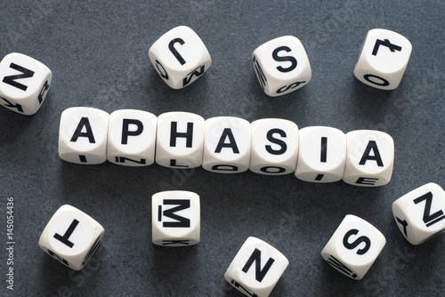 word aphasia on toy cubes