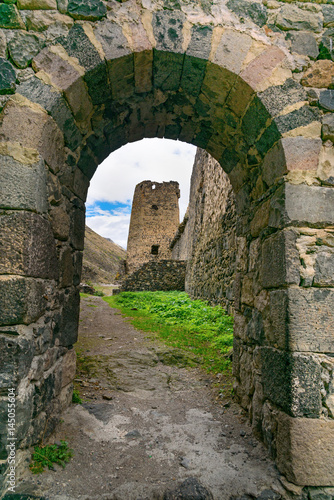 View through arch. Khertvisi fortress on mountain. Georgia