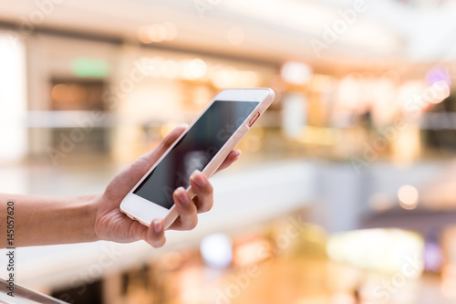 Hand holding cellphone