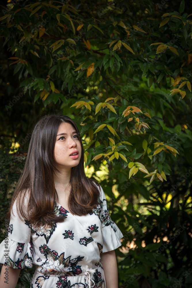 Asian beautiful young woman in the garden Asian beautiful young woman in the garden