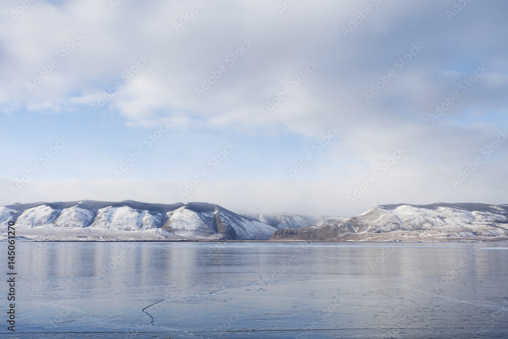 Lake Baikal ice. Mountains. Winter landscape
