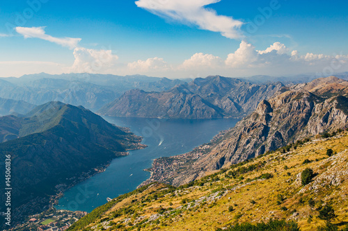 Bay of Kotor with bird s-eye view. The town of Kotor  Muo  Prcanj  Tivat. View of the mountains  sea  clouds