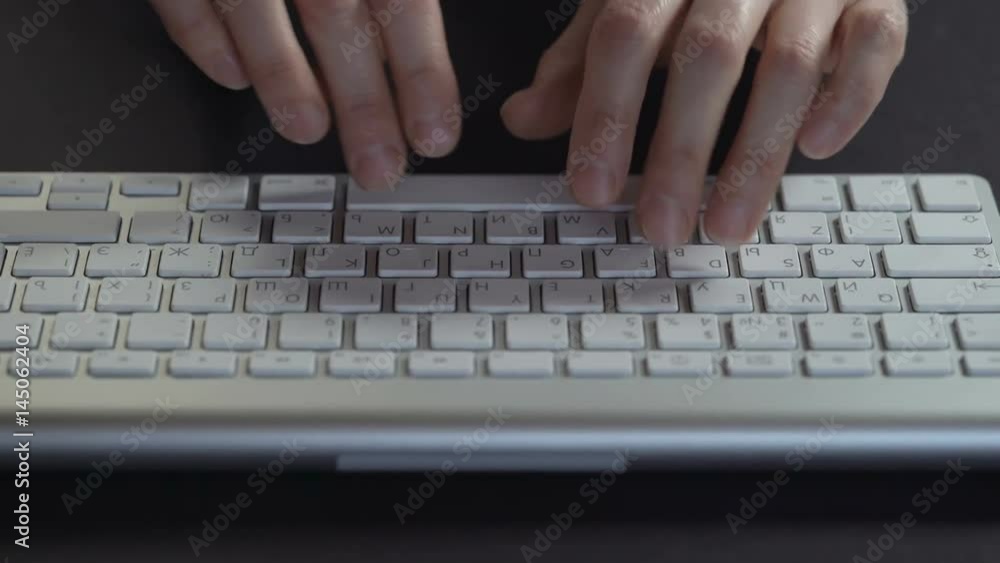 Women's hands on a computer keyboard close up - typing Women's hands on a computer keyboard close up - typing