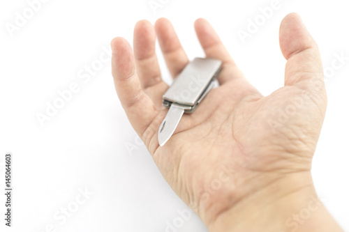 hand with knife multitool