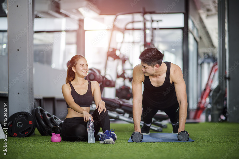 couple lover exercise active in gymnasium couple lover exercise active in gymnasium