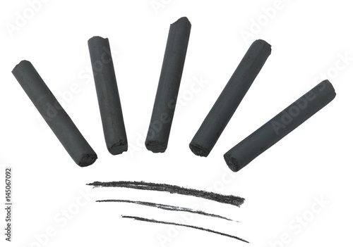 Artist's black charcoal for drawing isolated on white background