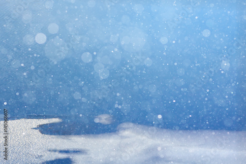 blurred winter background with snowflakes for text © kichigin19