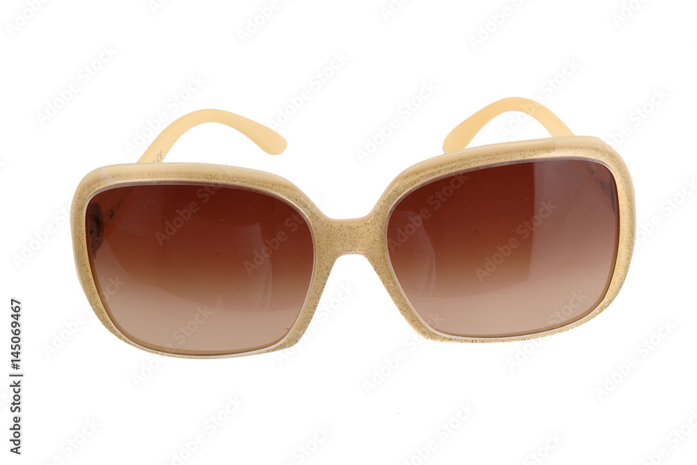 light brown glasses on a white background light brown glasses on a white background