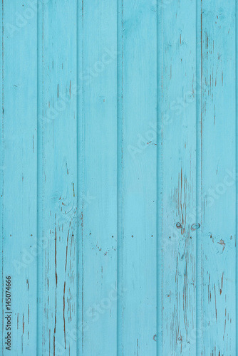 Old painted wooden wall. Seamless background texture of wood