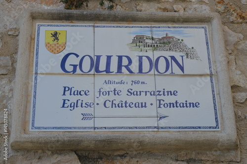 Obraz na płótnie Panneau dans Gourdon w salonie