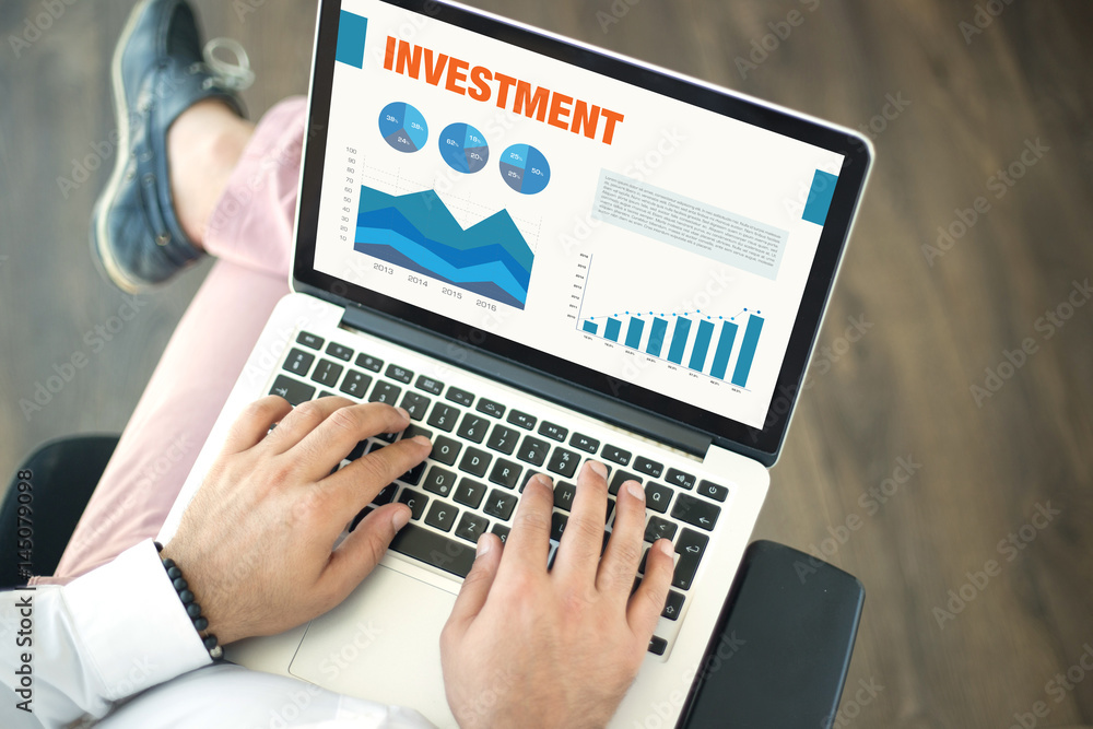 Business Charts and Graphs on screen with INVESTMENT title Business Charts and Graphs on screen with INVESTMENT title