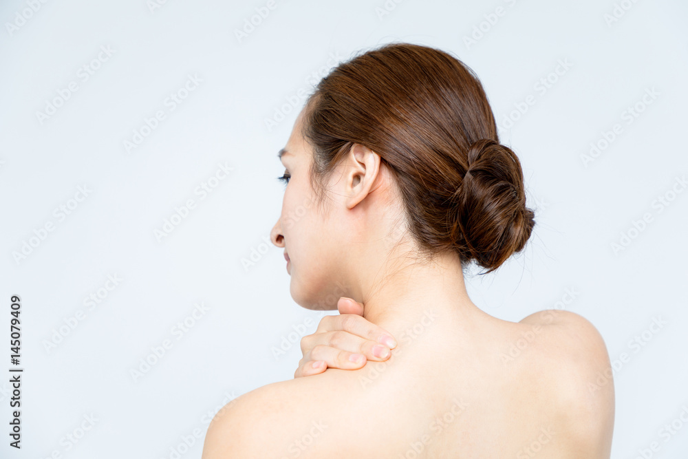 young woman having stiff shoulders. young woman having stiff shoulders.