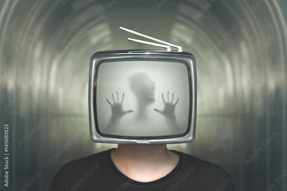 Fototapeta premium desperate man trapped in a television surreal concept