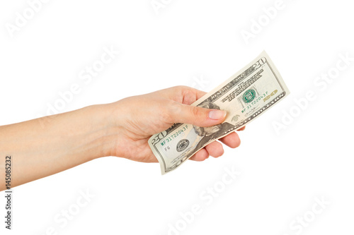 Twenty dollars in the woman's hand, isolated on white