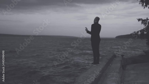 silhouette of man on the water