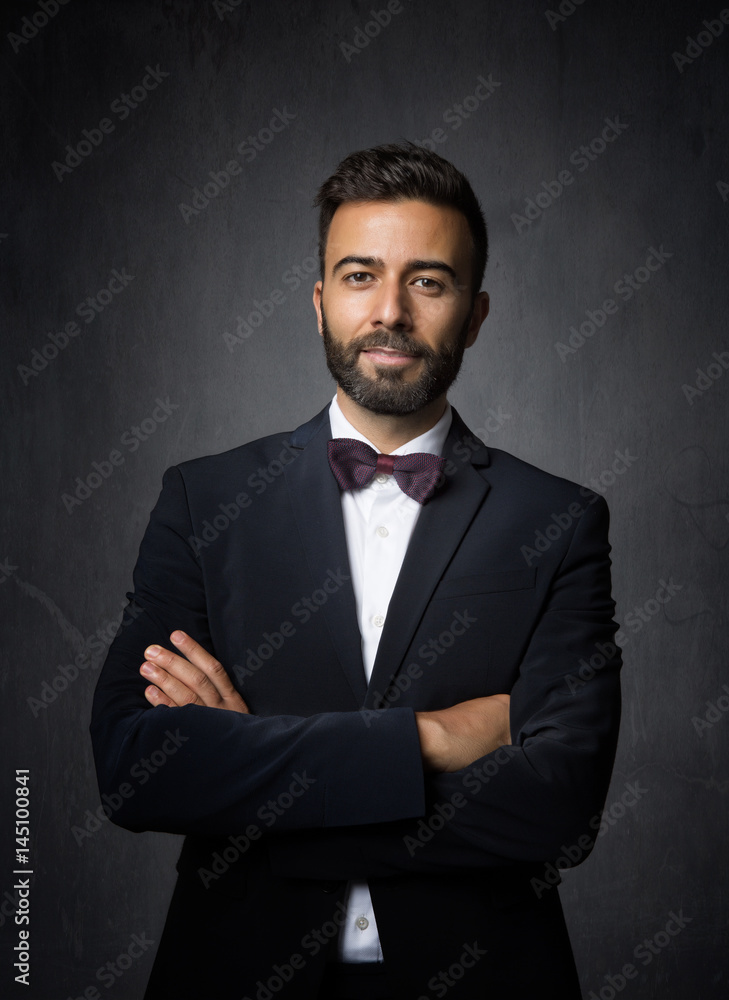 elegant man crossing arms elegant man crossing arms