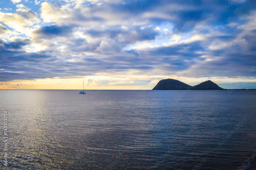 Sunset in Dominica over Caribbean Sea 