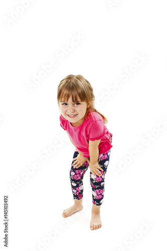 Funny little girl, posing. Isolated on white background 