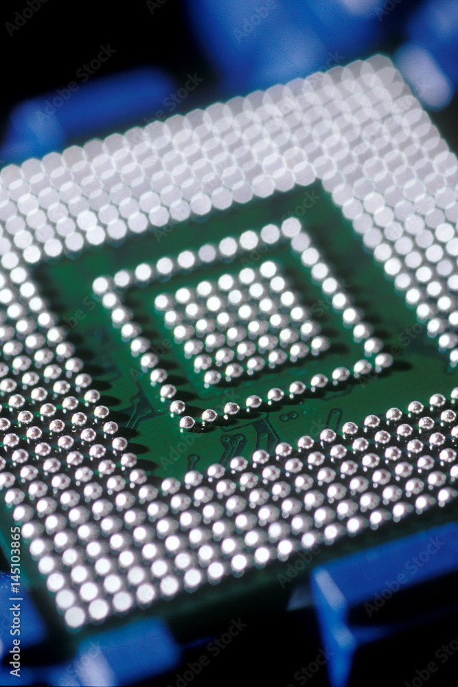 Close up of computer cpu chip with pins Close up of computer cpu chip with pins