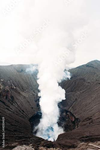 Crater of Bromo volcano in Bromo Tengger Semeru National Park, East Java, Indonesia. Erupting and active volcano