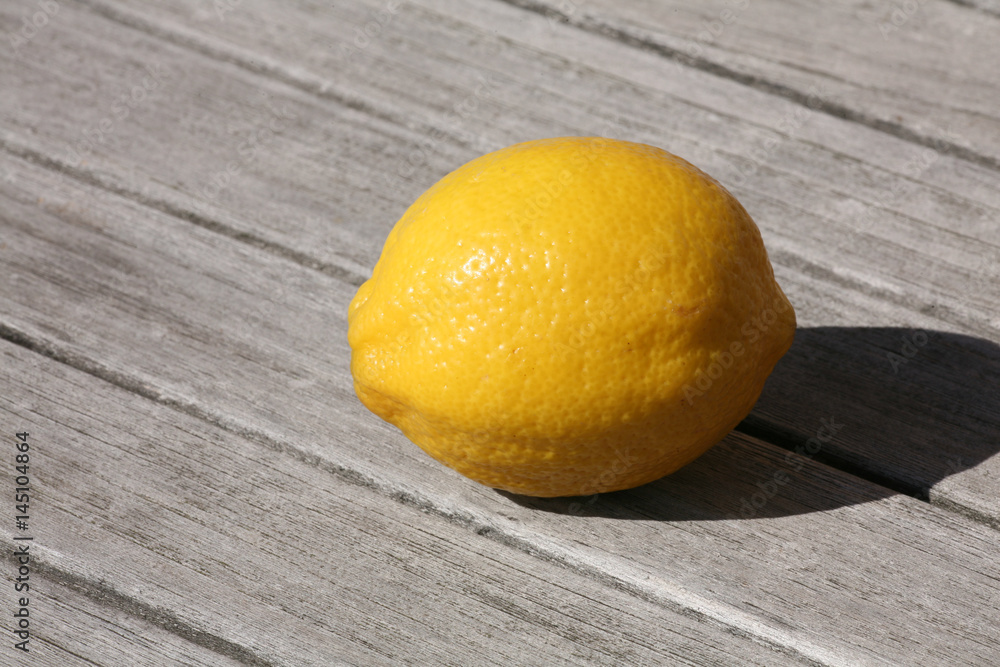 lemon on wooden table