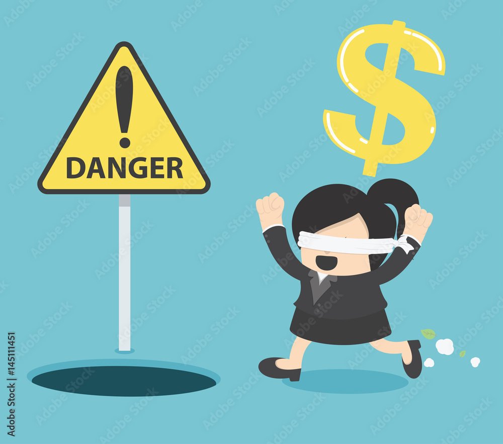 Blindfolded Business woman running to find money with pit hole. signs warn of danger Blindfolded Business woman running to find money with pit hole. signs warn of danger