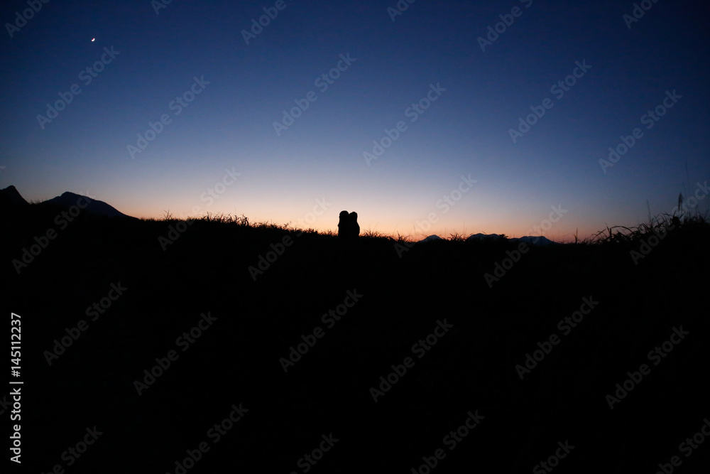 Dusk silhouette seen from the hill
