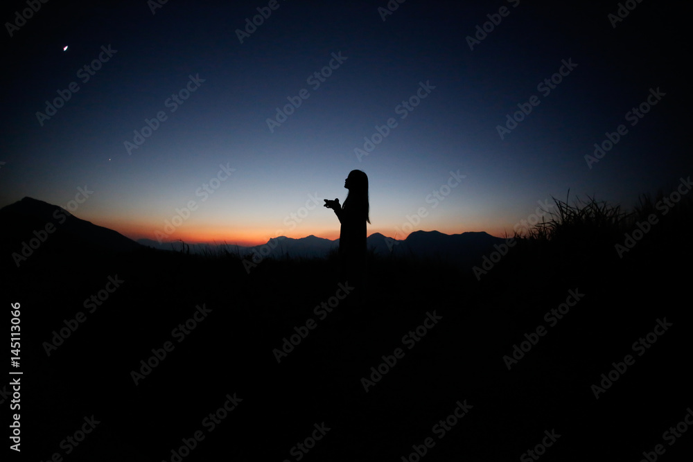 sunset silhouette, young lady in hill
