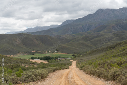 Gravel road between the Cango Caves and Calitzdorp © dpreezg