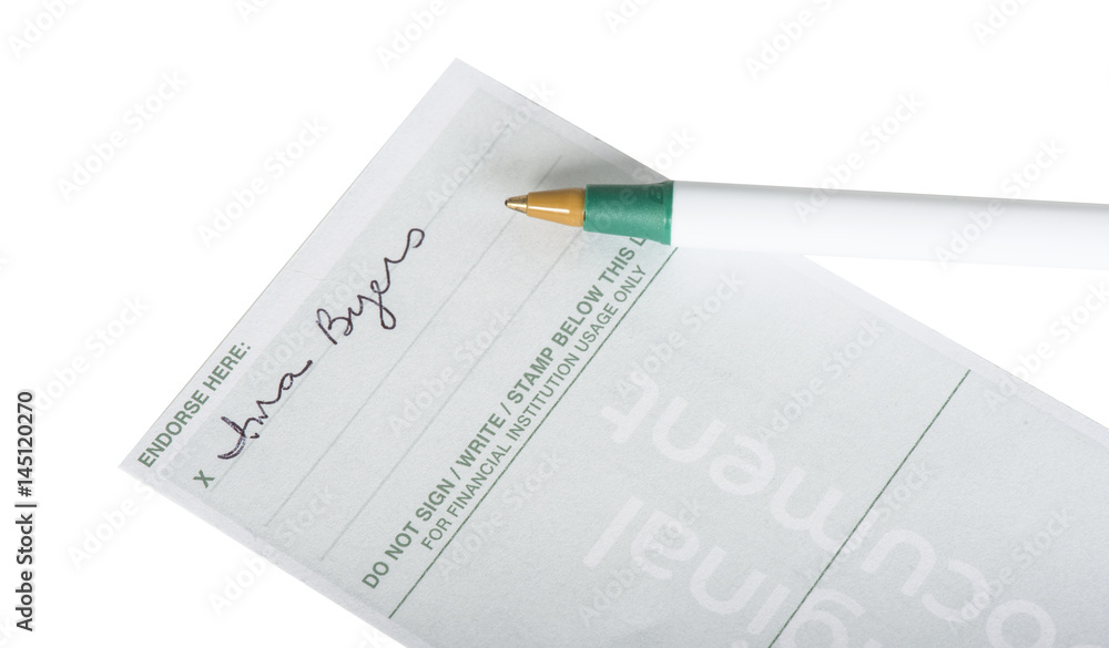 Endorsed personal check with a fake signature and pen isolated on white Endorsed personal check with a fake signature and pen isolated on white