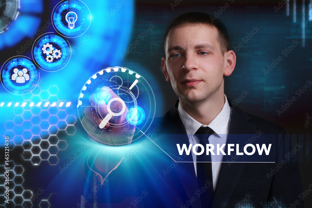 Business, Technology, Internet and network concept. Young businessman working on a virtual screen of the future and sees the inscription: Workflow Business, Technology, Internet and network concept. Young businessman working on a virtual screen of the future and sees the inscription: Workflow
