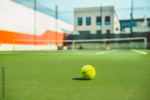 The tennis ball on a tennis court