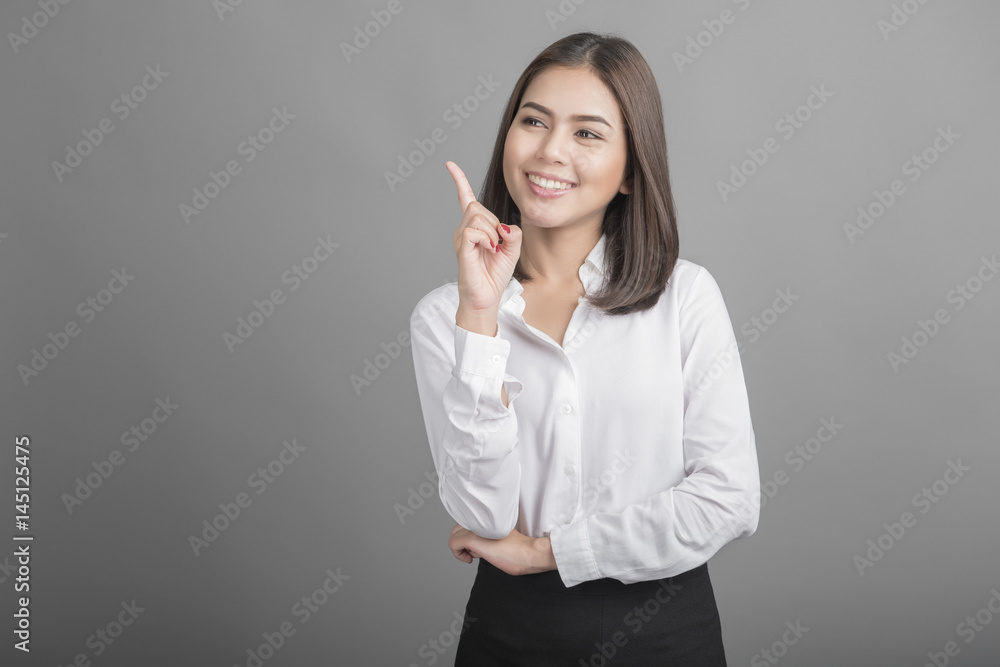 Beautiful Business Woman on grey background Beautiful Business Woman on grey background