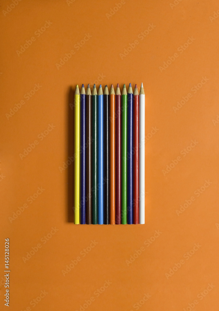 Colour pencils isolated on orange background. Colour pencils isolated on orange background.