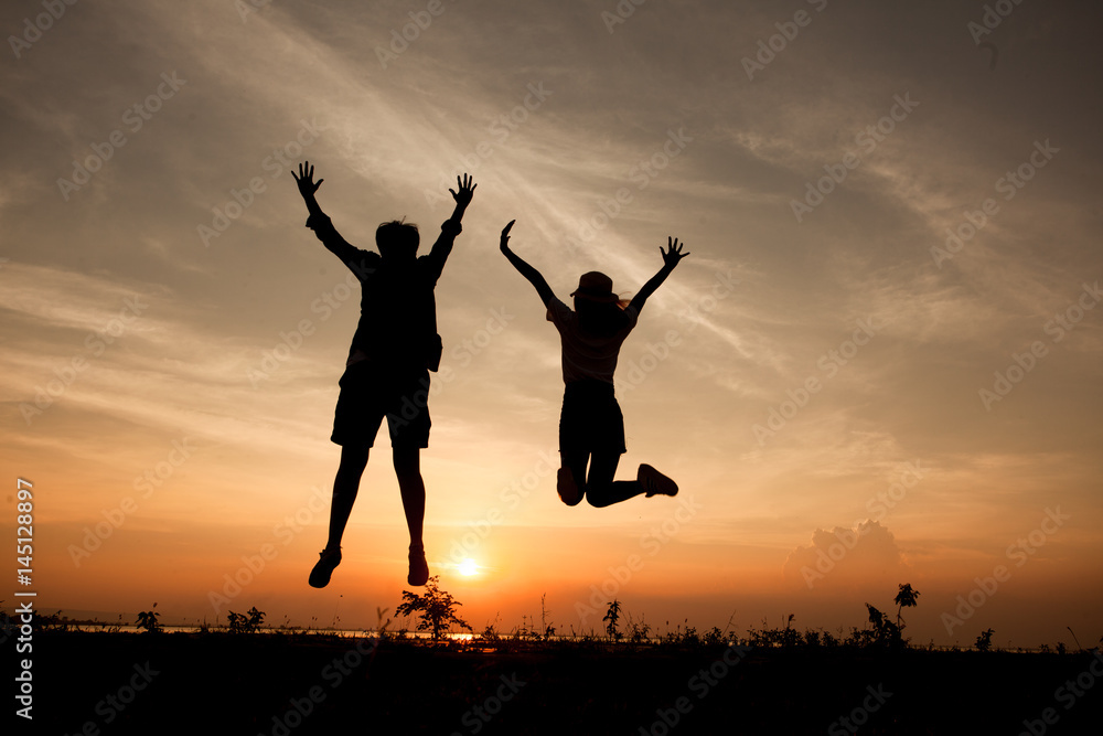 Romantic couple at colorful sunset on background Romantic couple at colorful sunset on background