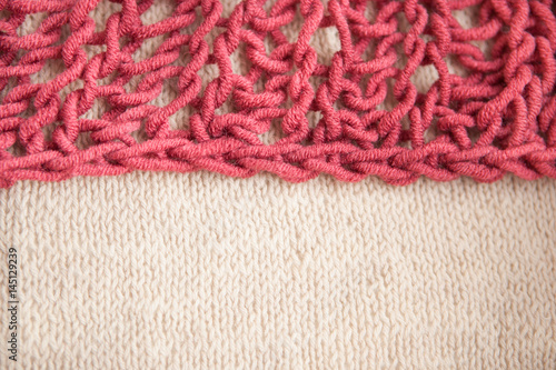 Double color combination - burgundy and beige knitting wool texture as abstract background