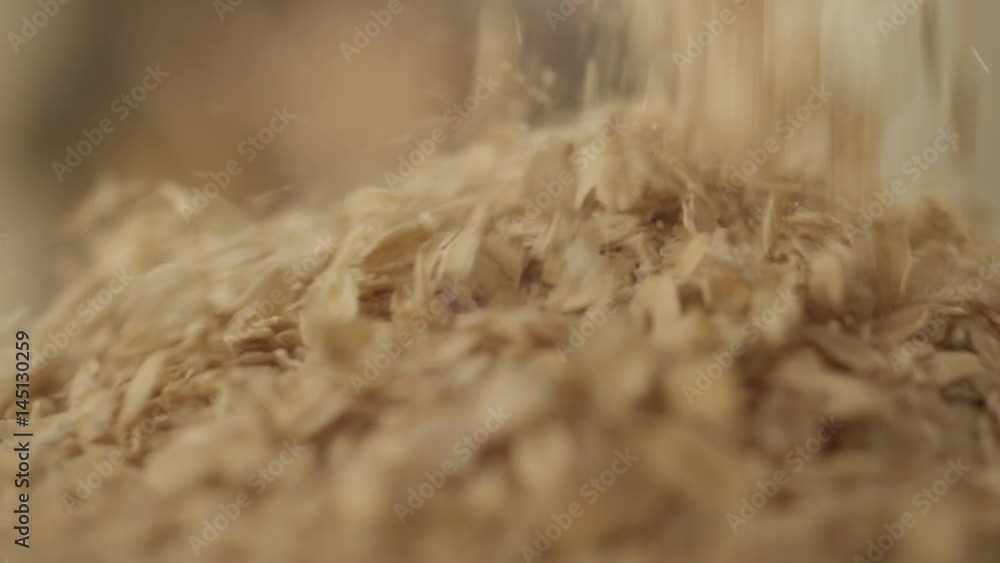 Oat flakes pile fall on glass RAPID 100fps Oat flakes pile fall on glass RAPID 100fps